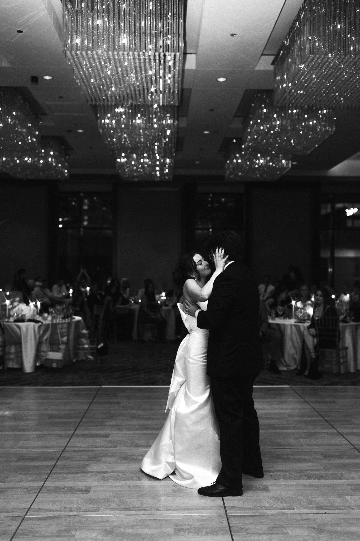 a bride and groom experiencing their first dance on their wedding day at the Four Seasons Denver